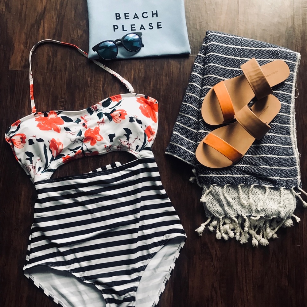 Floral & stripped one piece. Never worn.